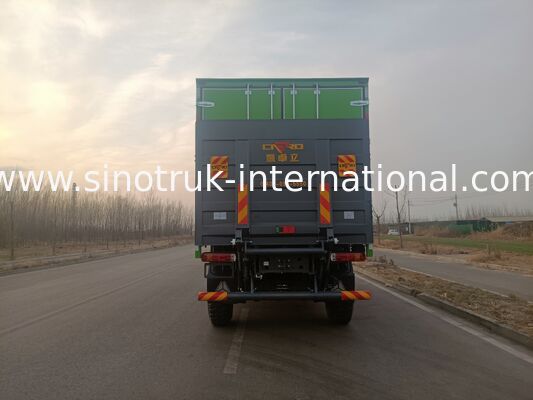 SINOTRUK Heavy Duty Truck with 4X4 LHD Drive Type, 5000*2300*2300 mm Cargo Tank, and 16T Rear Axle Capacity for Heavy Load Hauling Green